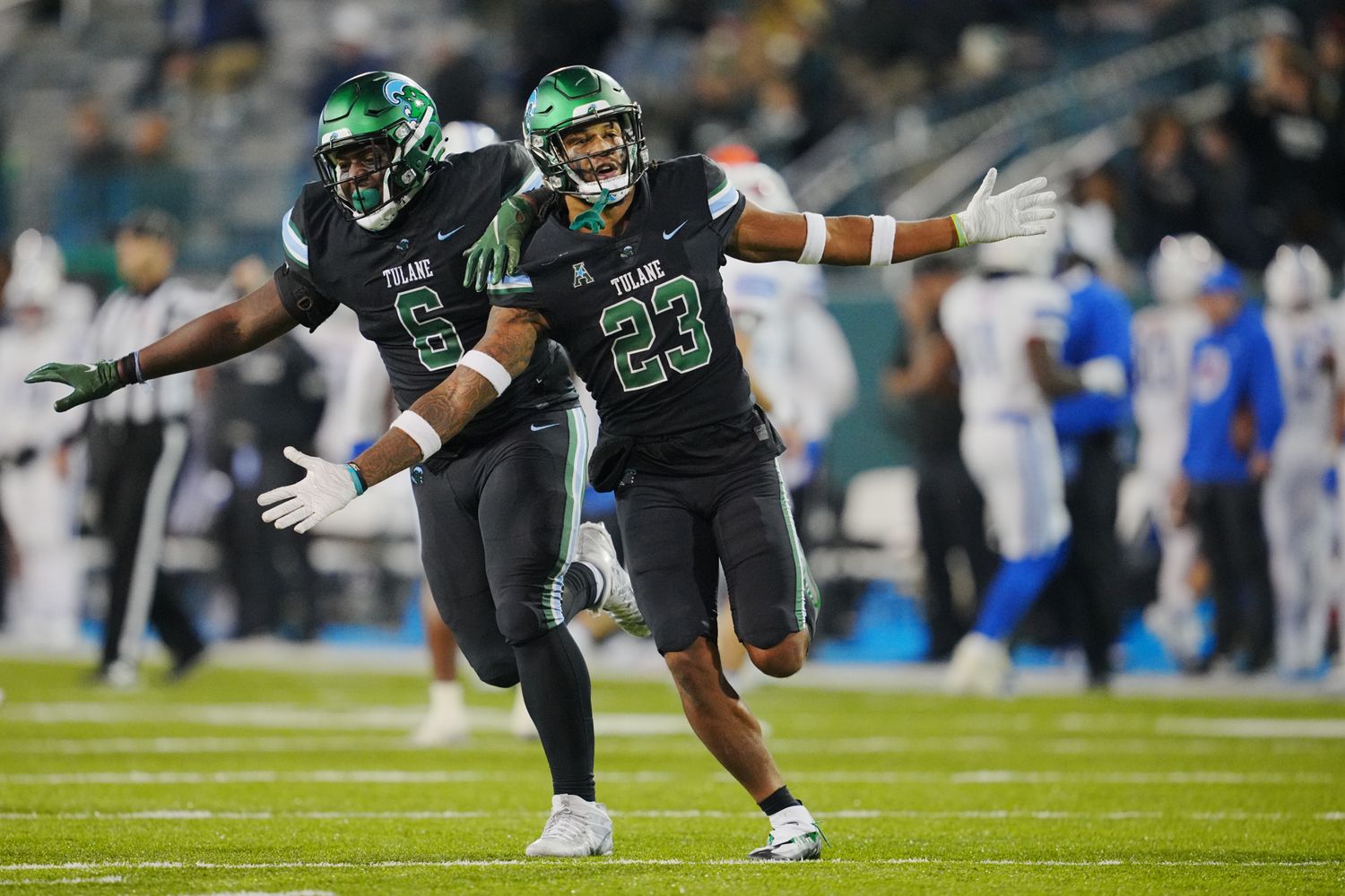 Nov 17, 2022; New Orleans, Louisiana, USA; Tulane Green Wave safety Lummie Young IV (23) celebrates an interception against the Southern Methodist Mustangs during the second half at Yulman Stadium. Mandatory Credit: Andrew Wevers-USA TODAY Sports
